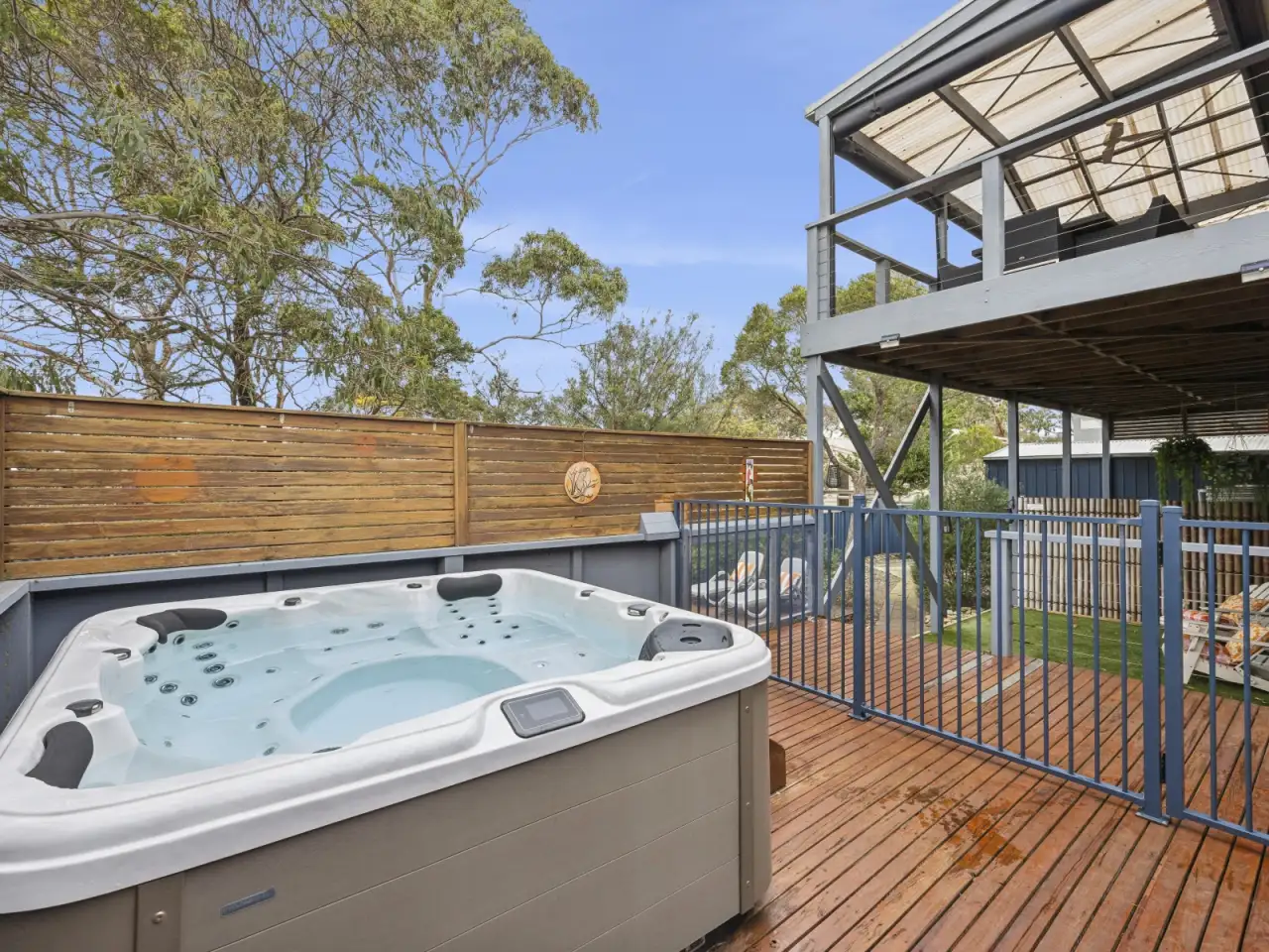 Outdoor spa on the lower deck